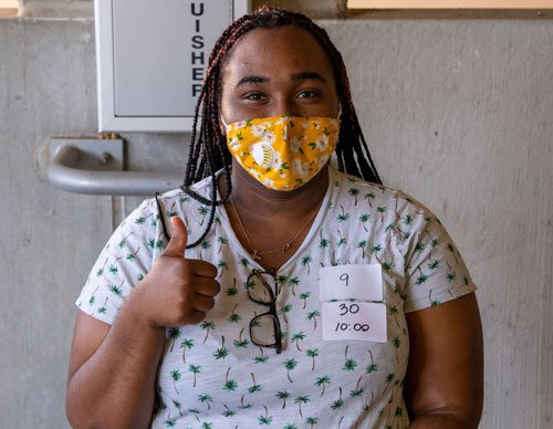 Hannah-Burrows-gives-the-thumbs-up-after-receiving-her-vaccine-w